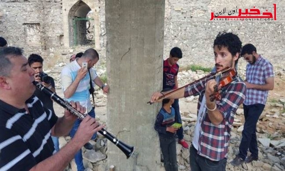 صور / عازف  الكمان  ، أجبره  " داعش " على الهرب  من الموصل  بسبب موسيقاه ..وعاد إليها  عازفا ما لحّنه سرا