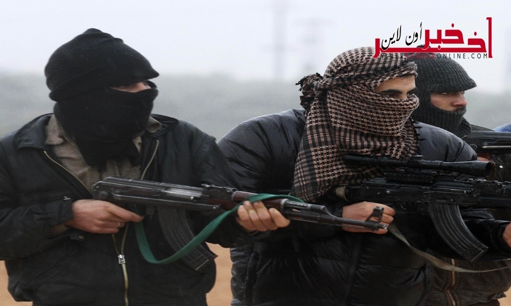مسلحون يجردون عجوزا مصرية  من ملابسها ويجوبون بها الشارع عارية لانها مسيحية